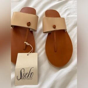Sseko Cream Leather Slide Sandals with Tan Footbed